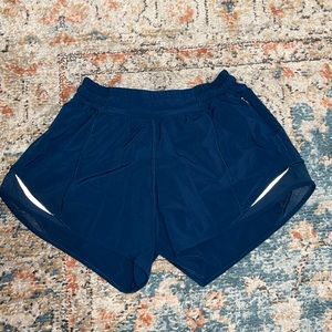 Lululemon pair of blue Hotty Hot shorts. Size 4 Tall
